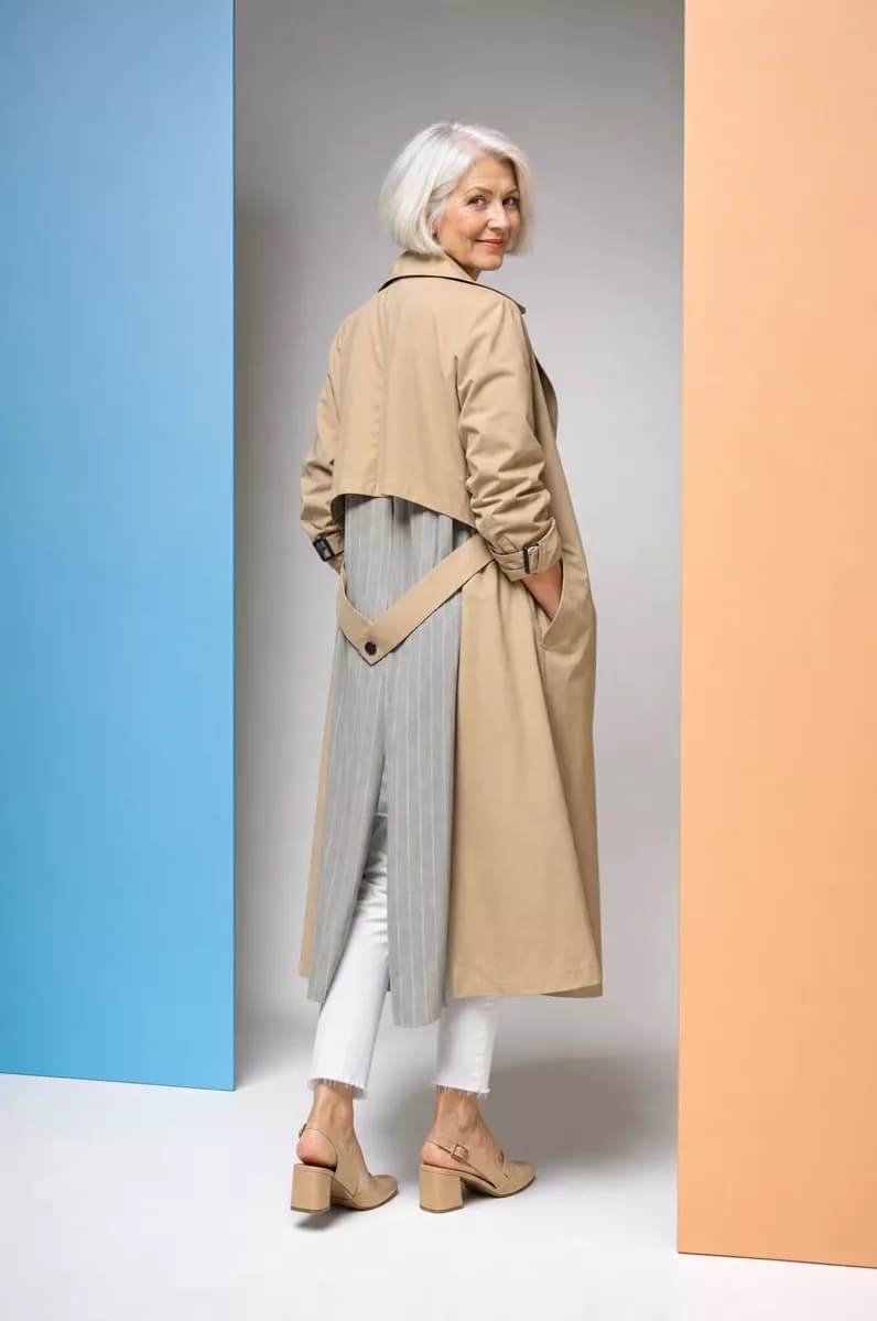 Fashion and beauty: A full-length studio fashion shot of an elegant older woman with a short white b