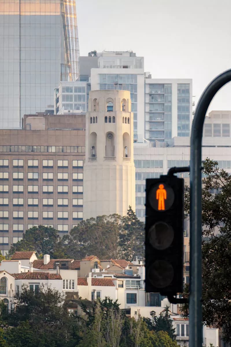 Street and architecture: A vertical telephoto city view with strongly compressed layers of buildings: in 