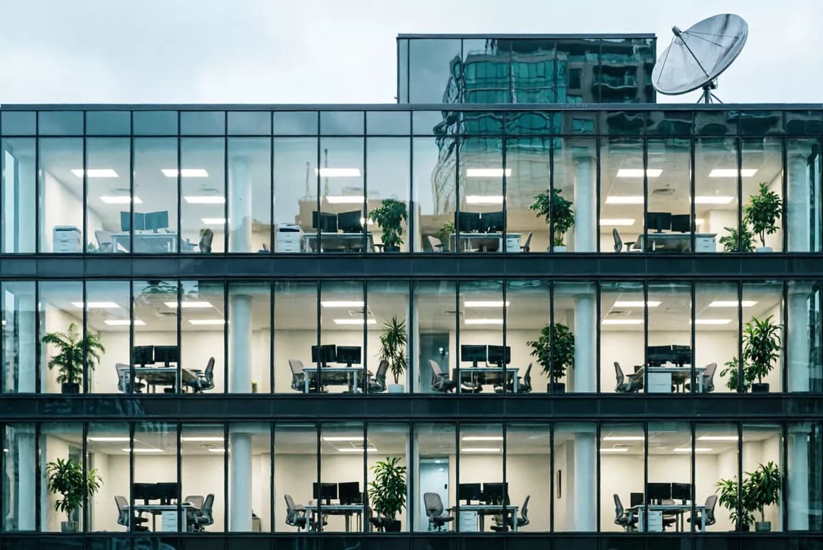 Qwen Image 2.0 — Street and architecture: A flat frontal telephoto view of part of a glass office tower facade, filling th