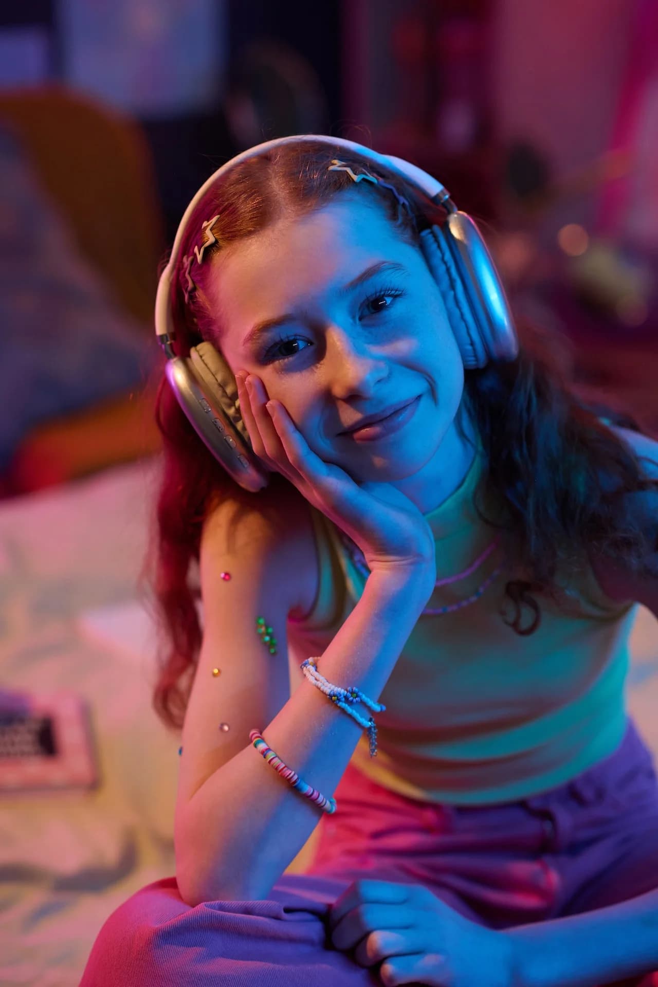 Girl with headphones smiling